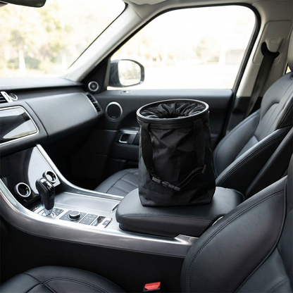 Cubo de basura para coche en la consola central